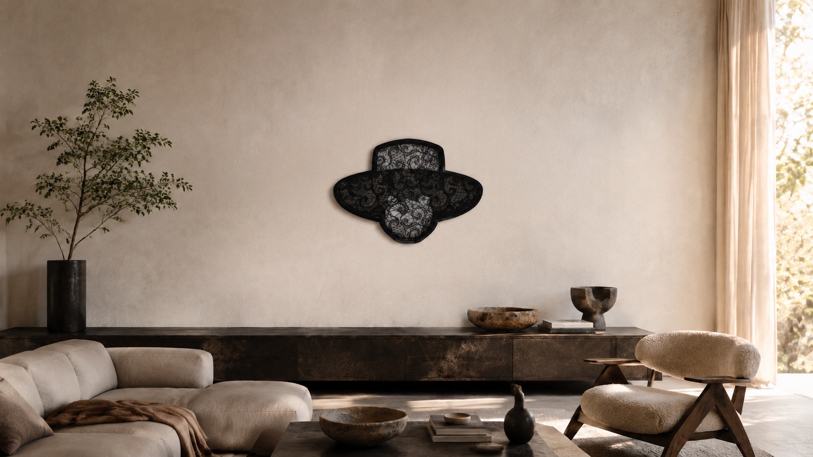 Hero Reliefs black sculptural wall objects with intricate openwork