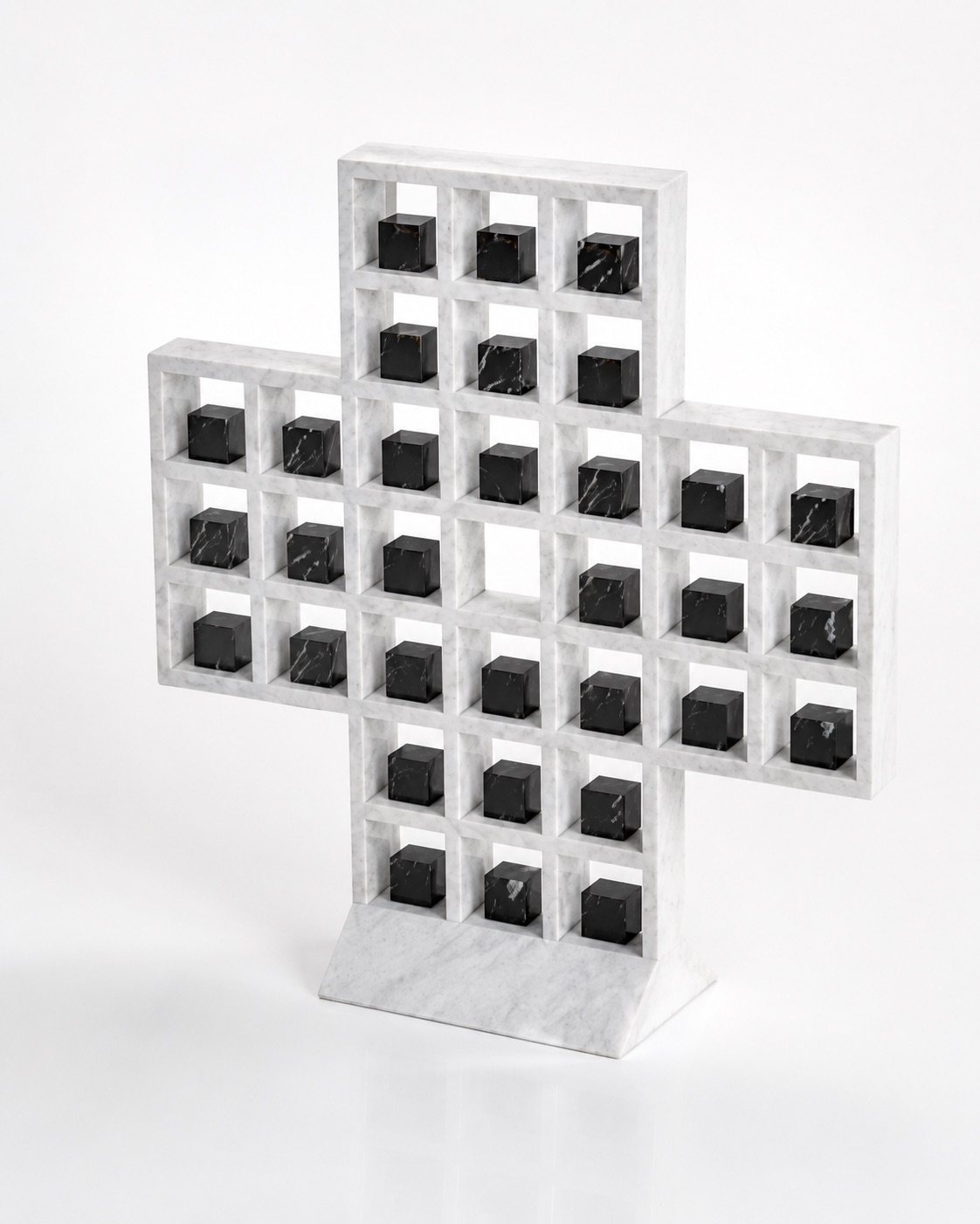 Standing Grid sculptural object in white stone with dark cubes, view 2